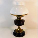 An early 20thC. brass fitted oil lamp 18in high