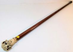 A gents walking cane with novelty dog handle 36.25