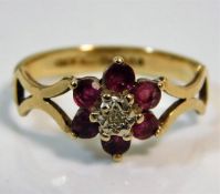 A 9ct gold ring set with diamond & ruby 1.9g size