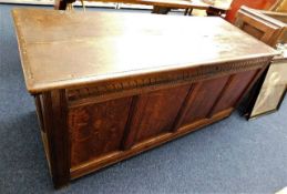 A large 18thC. oak coffer with internal candlebox