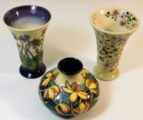 Three Moorcroft pottery vases, tallest 6.125in tal