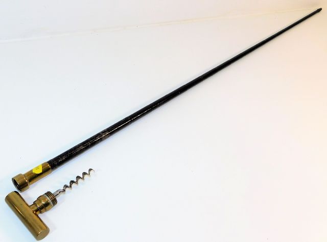 A gents steel & brass walking cane with concealed