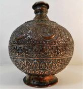 An 18thC. Persian copper wine vessel 10.5in high