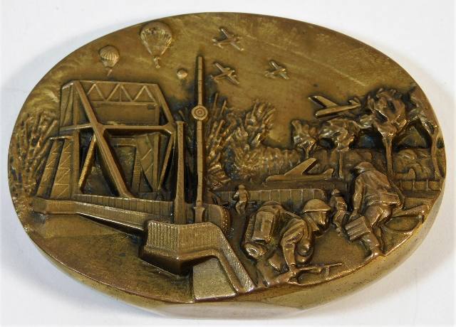 A bronze Pegasus Bridge D-Day commemorative bronze paperweight 3in wide x 2.25in high