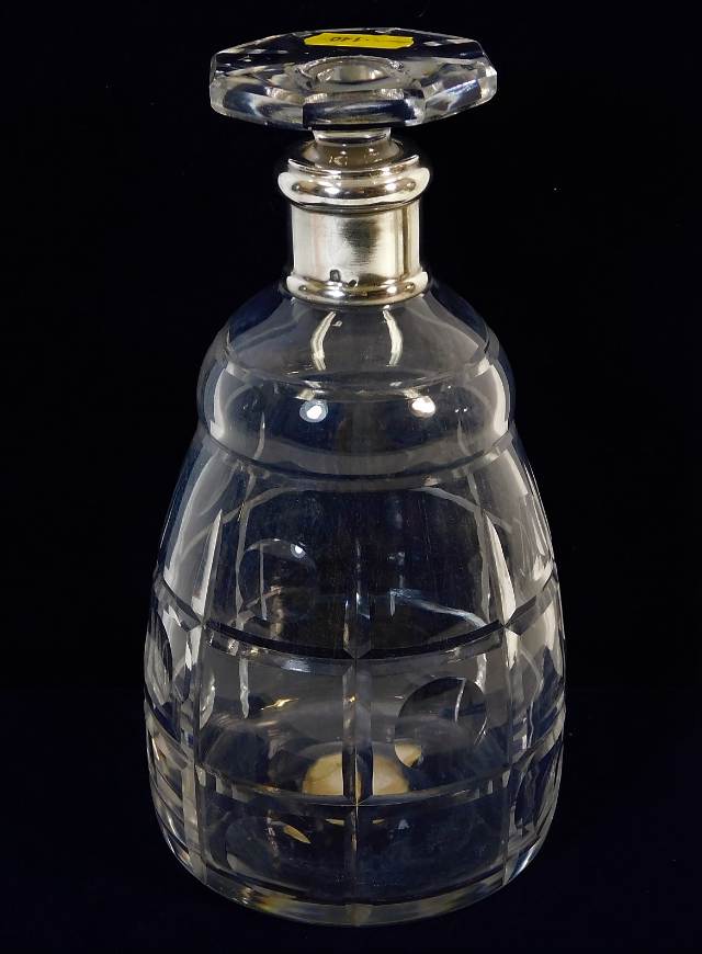 A French silver collared crystal decanter 8in tall