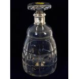 A French silver collared crystal decanter 8in tall