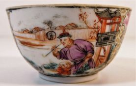 A 19thC. Chinese porcelain tea bowl with man smoki