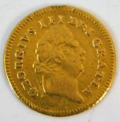 An 1803 George III third guinea gold coin approx.