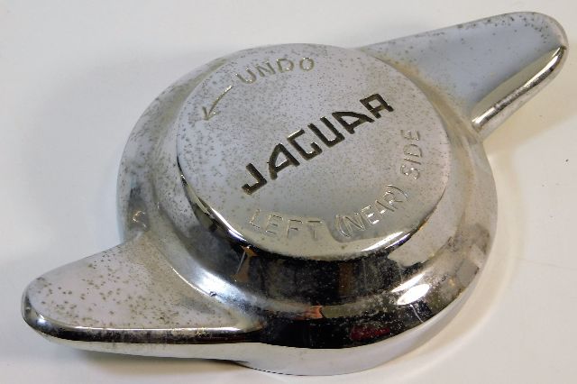 A chrome Jaguar left near side wheel hub cover 7in