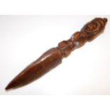 A 19thC. tribal art carved ceremonial stake with i
