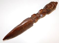 A 19thC. tribal art carved ceremonial stake with i