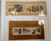 Two Davo Chinese mint stamp albums, approx. 124 pa