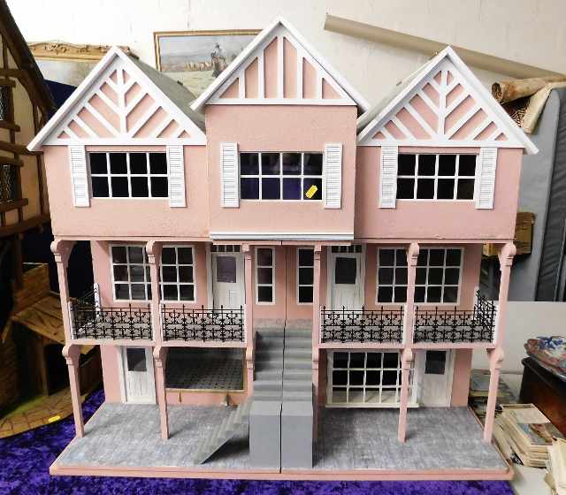 A large American style dolls house 35.25in high x