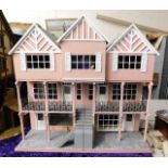 A large American style dolls house 35.25in high x