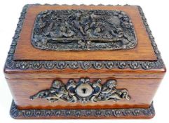 A decorative tea caddy with relief copper decor 8.5in wide x 6.5in deep x 4in tall