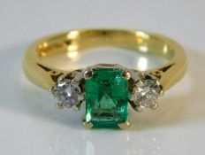 An 18ct gold emerald & diamond ring 3.7g size J