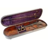 A 19thC. violin with original fitted case
