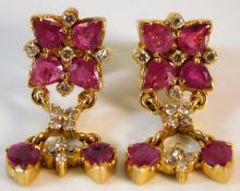A pair of rose gold (test as 18ct gold) Burma ruby