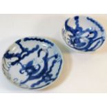 A Chinese blue & white tea bowl & stand with drago