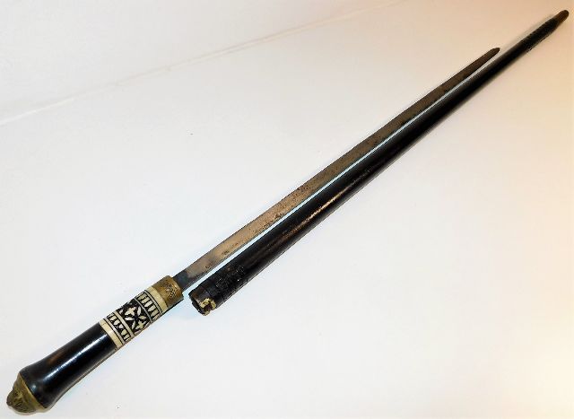A gents sword stick walking cane with inlaid bone