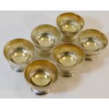 A set of six London silver footed bowls with gadro