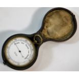 A cased brass barometer by Thompson Ashford