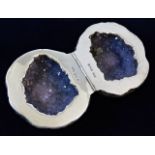 A hallmarked silver mounted split amethyst geode.