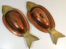 A pair of large tin lined copper & brass fish serv