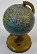 A vintage 1950's tinplate globe 8in high