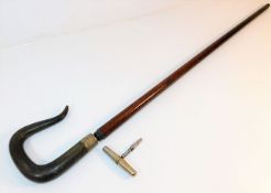 A gents horn handled walking cane with concealed t