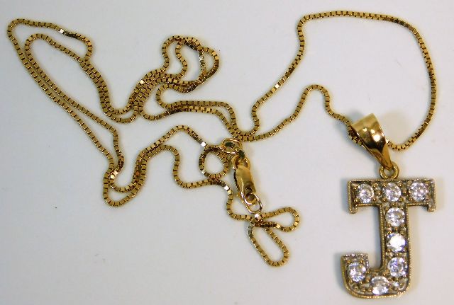 A 9ct gold chain with J motif pendant 4.1g