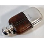 A 1910 silver mounted hip flask by G & J W Hawksle