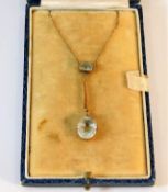 An Edwardian 15ct gold necklace set with aquamarin