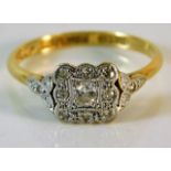 An early 20thC. 18ct ring set with approx. 0.15ct