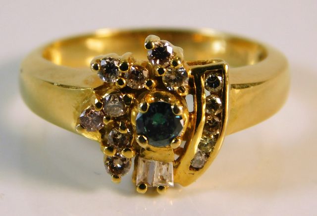 An 18ct gold ring set with fancy blue diamond & wh