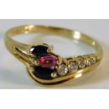 A 9ct gold ring with sapphire, ruby & diamond 4g s