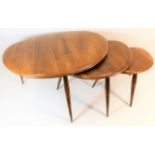 A retro Ercol nest of pebble tables