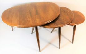 A retro Ercol nest of pebble tables