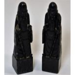 A pair of antique Chinese black jade chess pieces,