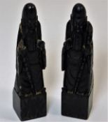 A pair of antique Chinese black jade chess pieces,