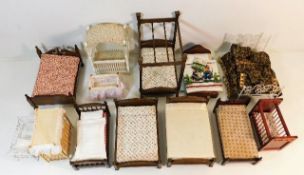 A quantity of miniature dolls house bedroom furnis