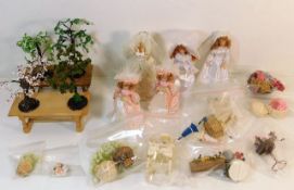 A quantity of miniature bridal shop fittings