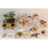 A quantity of miniature bridal shop fittings