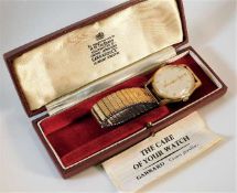 A gents gold Omega wristwatch, inscribed to case o