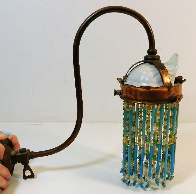 An Edwardian Veritas Shell Burner copper gas lamp