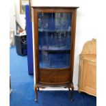 A good c.1900 mahogany silver cabinet with convexe