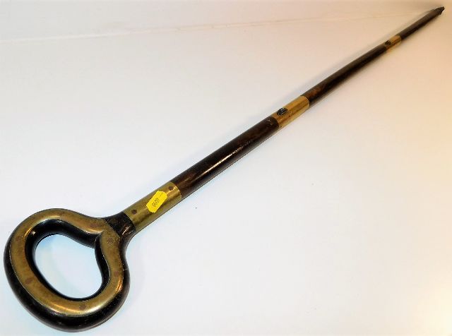 A brass fitted segmented cane, possibly of railway