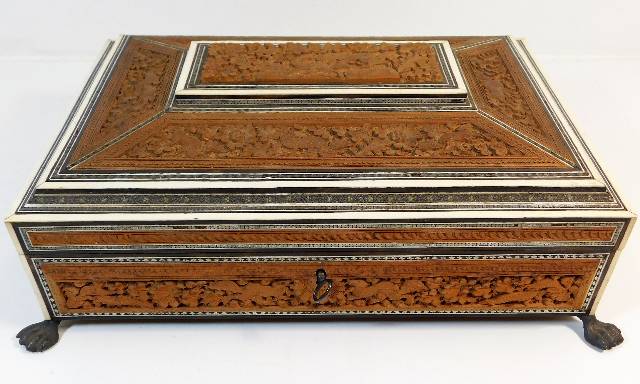 A 19thC. ladies carved sandalwood sewing box
