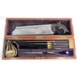 A 19thC. mahogany medical surgeons case with instr