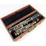 A cased E. J. Albert Brussels clarinet